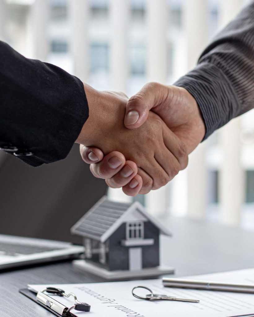 image of a CSB Insurance Services agent providing a policy for a new client